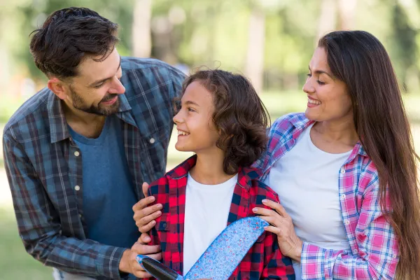 smiley-parent-child-together-outdoors-park